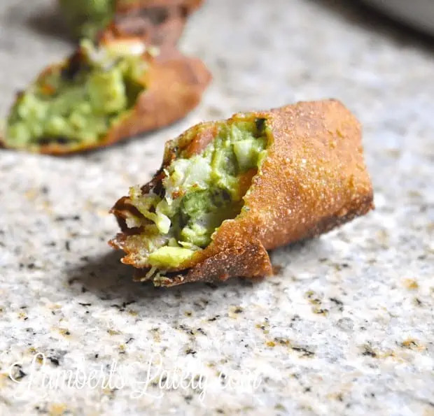 Guacamole Egg Rolls with white queso and salsa to dip.  This sounds so amazing!