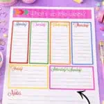 Colorful free weekly planner printable with sections for each day and notes, on purple background.