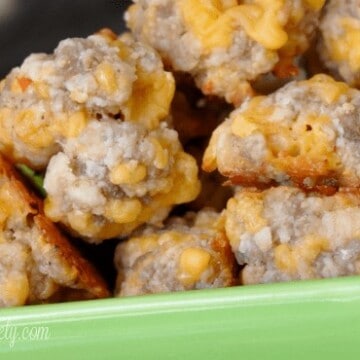 Easy recipe for savory cheesy sausage balls - you probably have most of the ingredients on hand! The cream cheese makes them so rich and delicious.