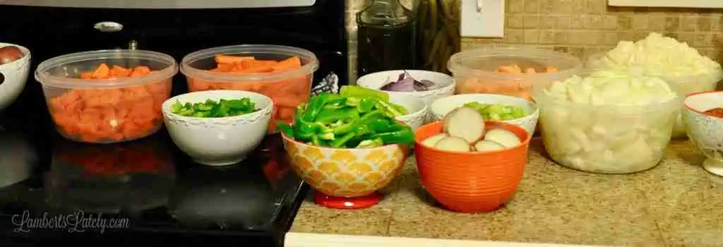 different veggies in bowls on a counter.