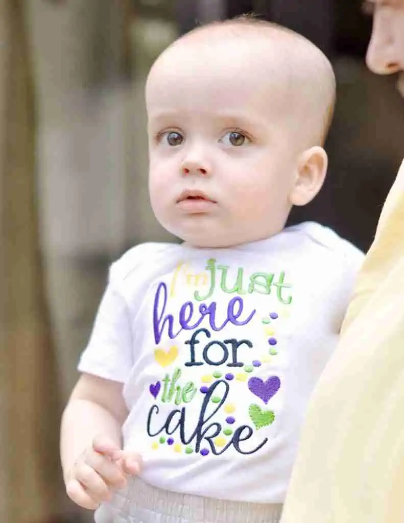 baby in I\'m just here for the cake shirt.
