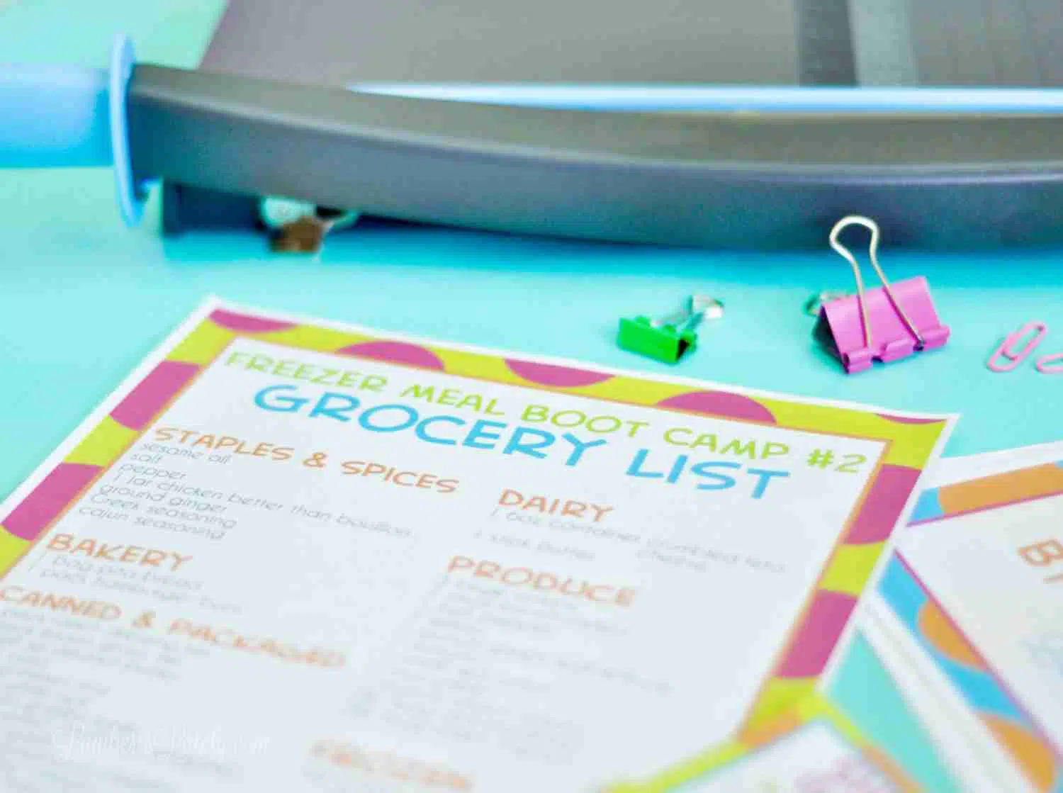 freezer meal grocery list printable on a blue background.
