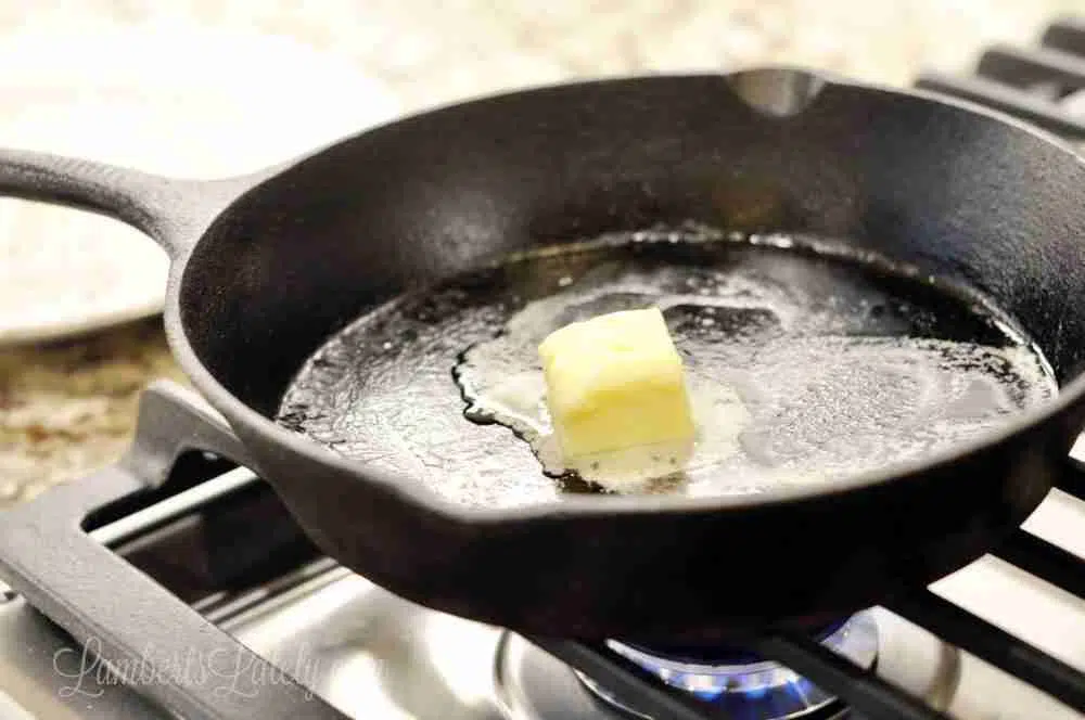 butter melting in a cast iron skillet.