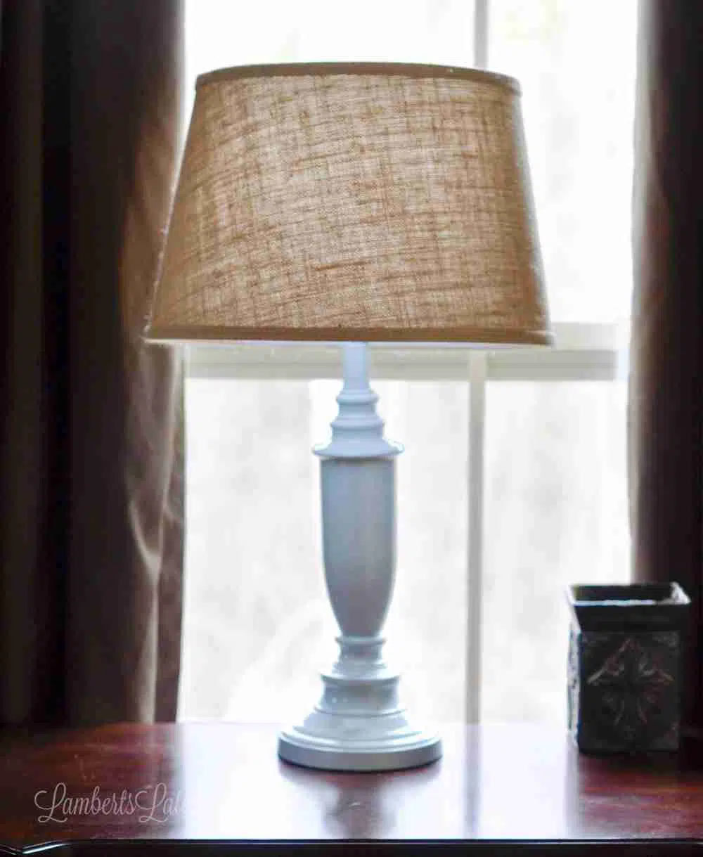 light blue lamp with neutral lamp shade.