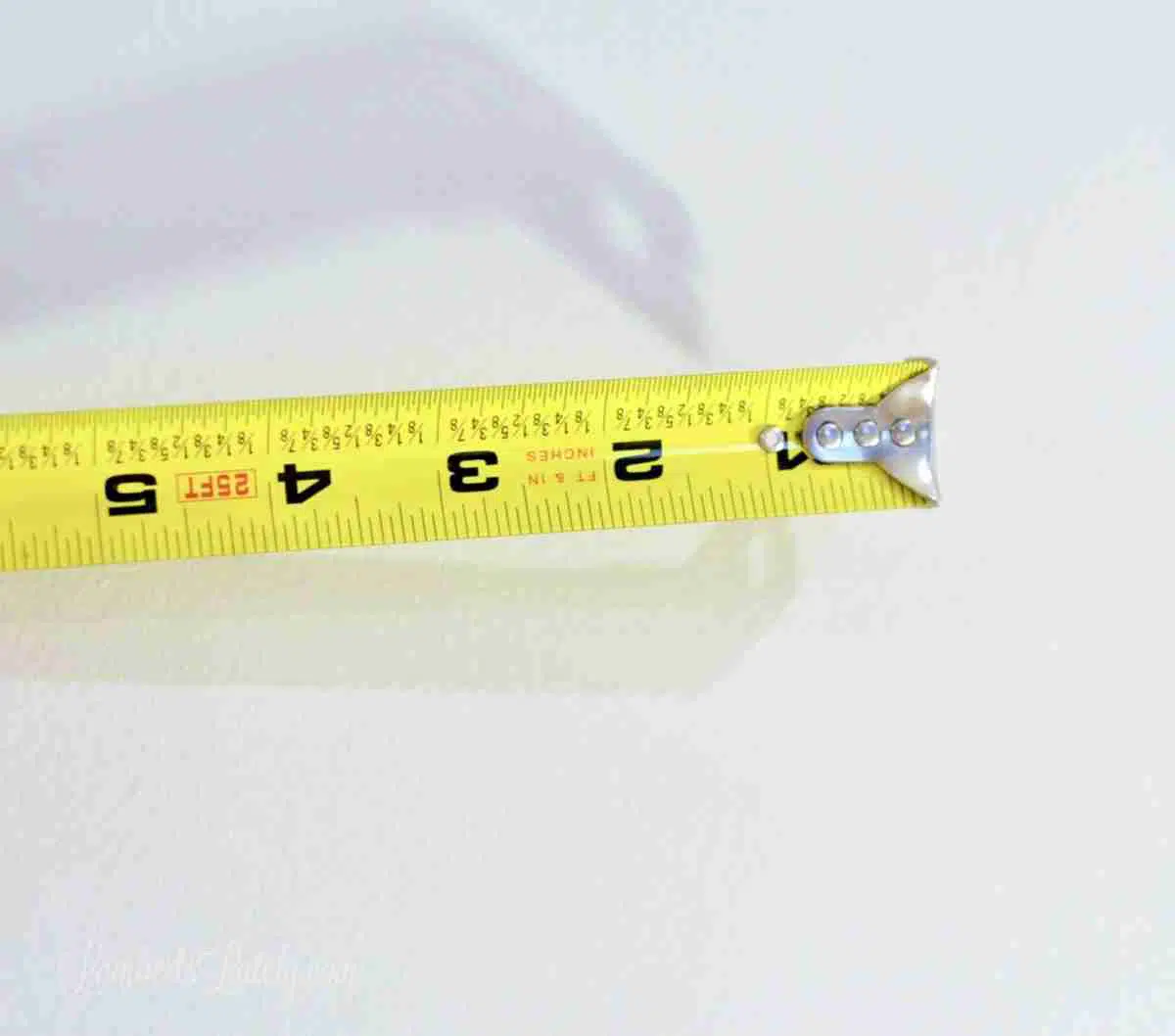 end of measuring tape.