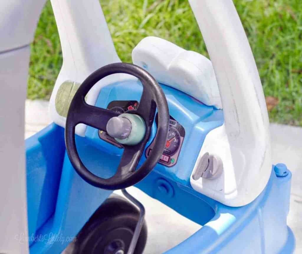 inside of little tikes cozy coupe after painting.