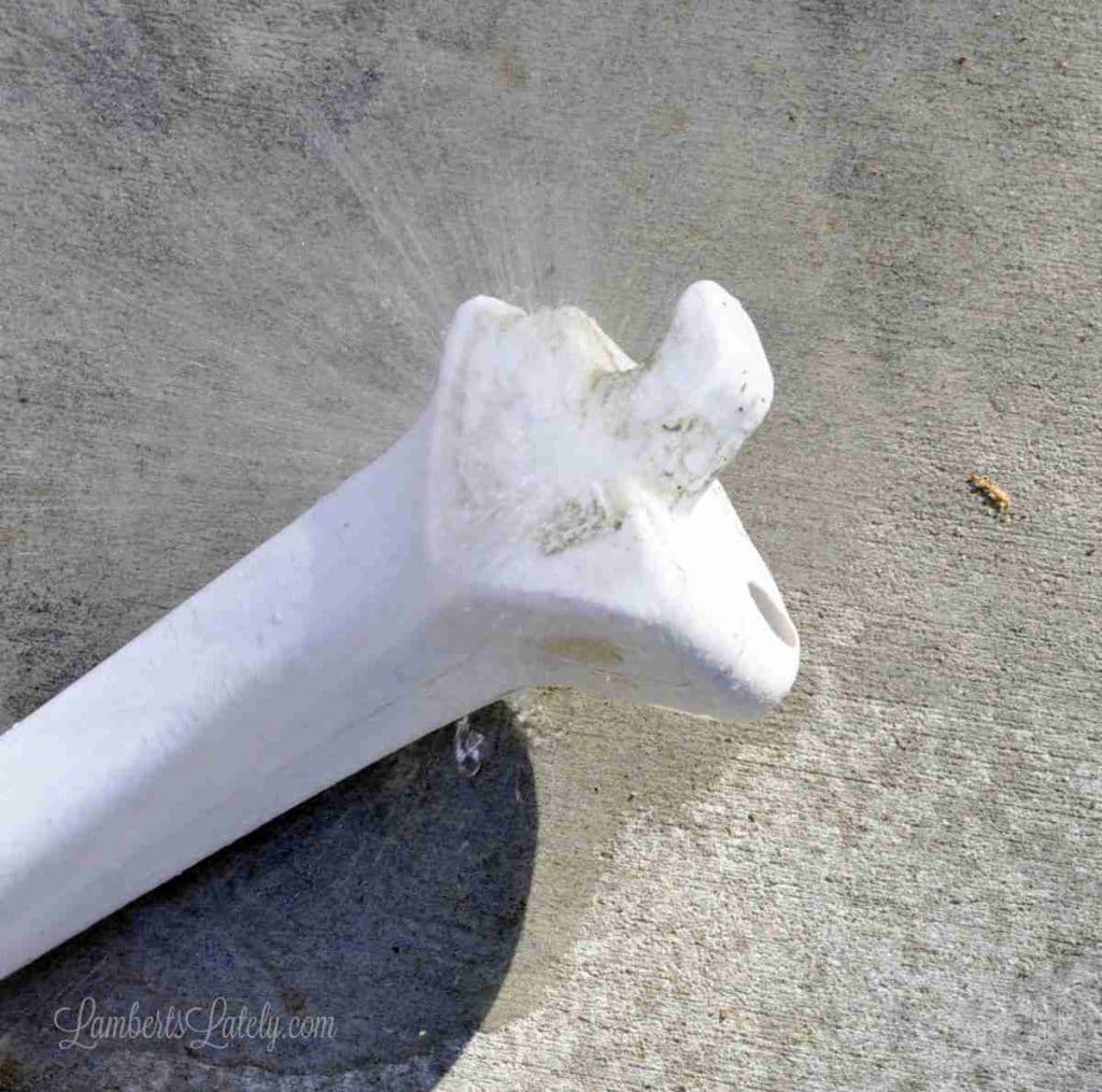 edge of top of cozy coupe after disassembling, dirty.