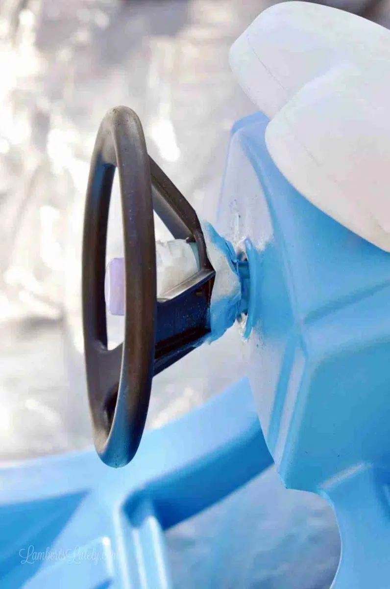 steering wheel of cozy coupe after painting around.