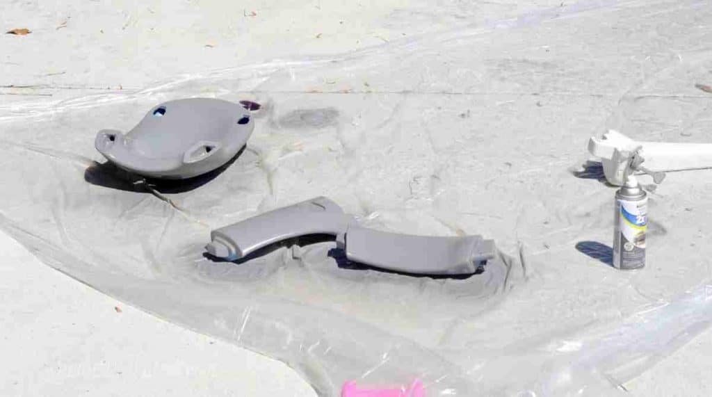 parts of top of cozy coupe after painting gray.