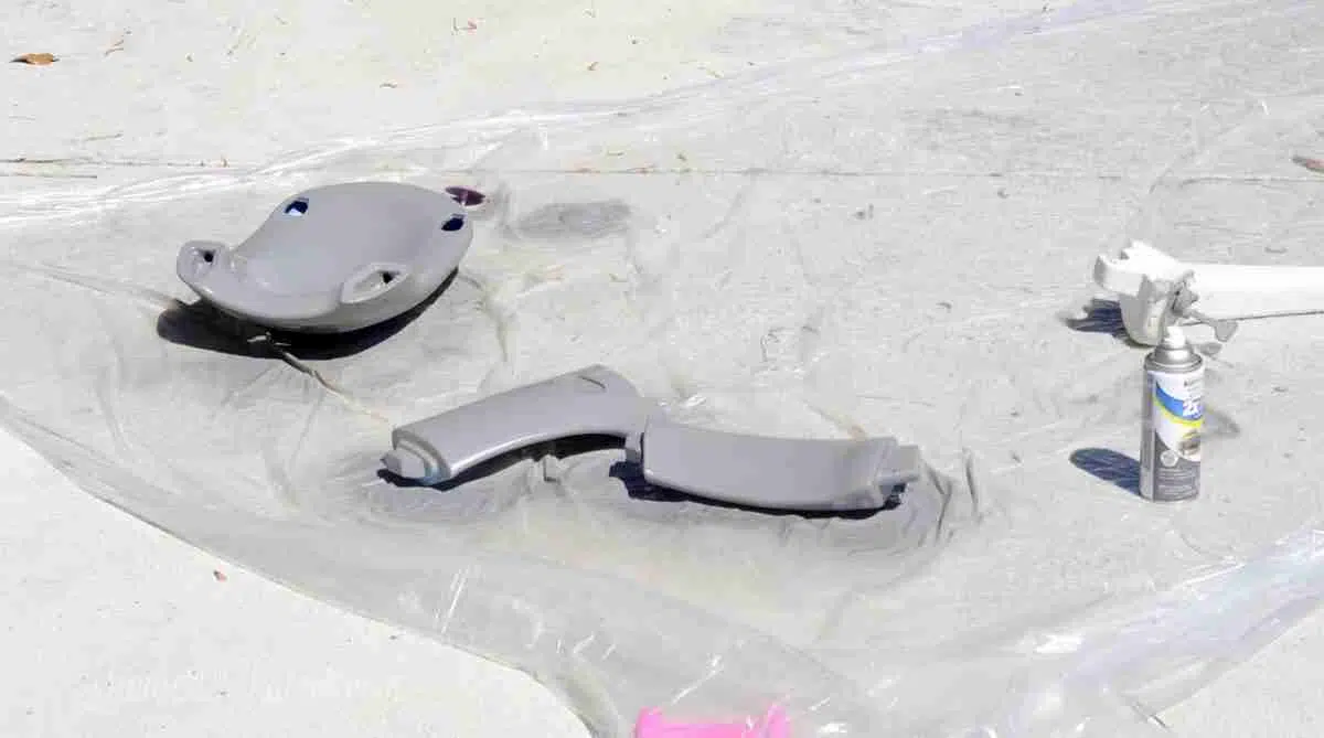 parts of top of cozy coupe after painting gray.