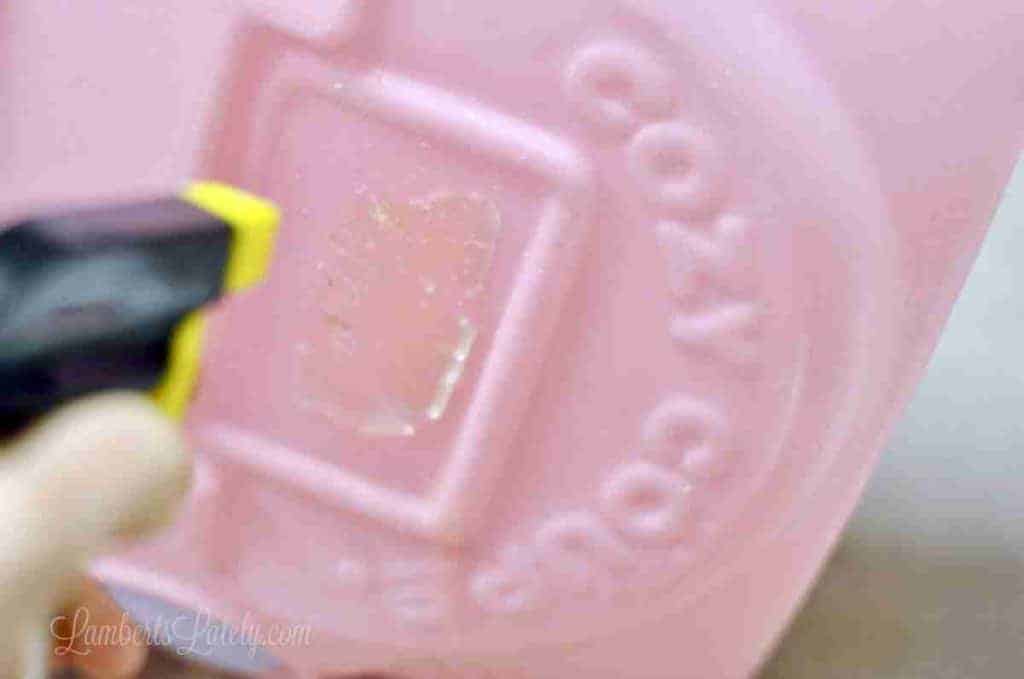 spraying decal residue with goo gone.