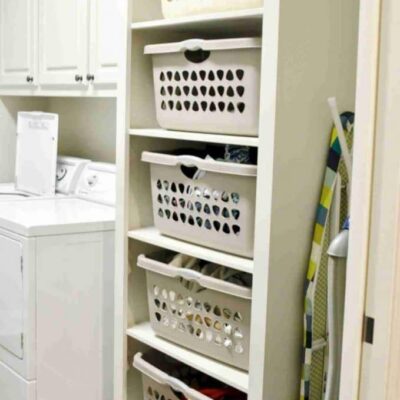 stackable laundry basket cabinet in a laundry room.