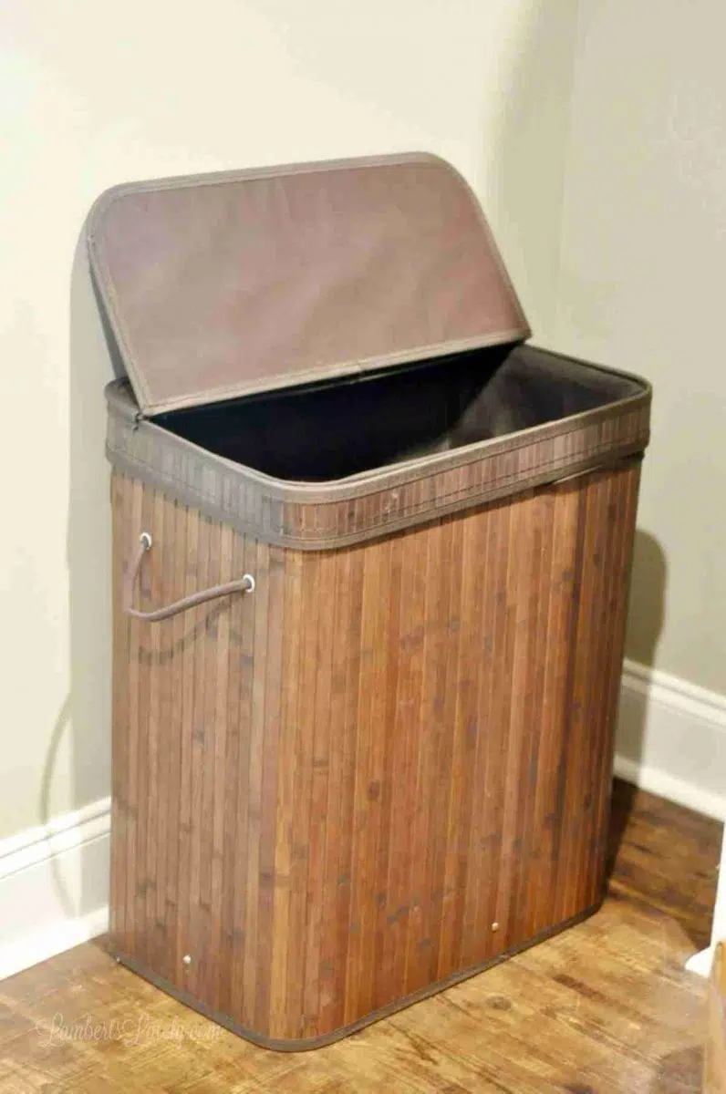 brown wood laundry hamper.