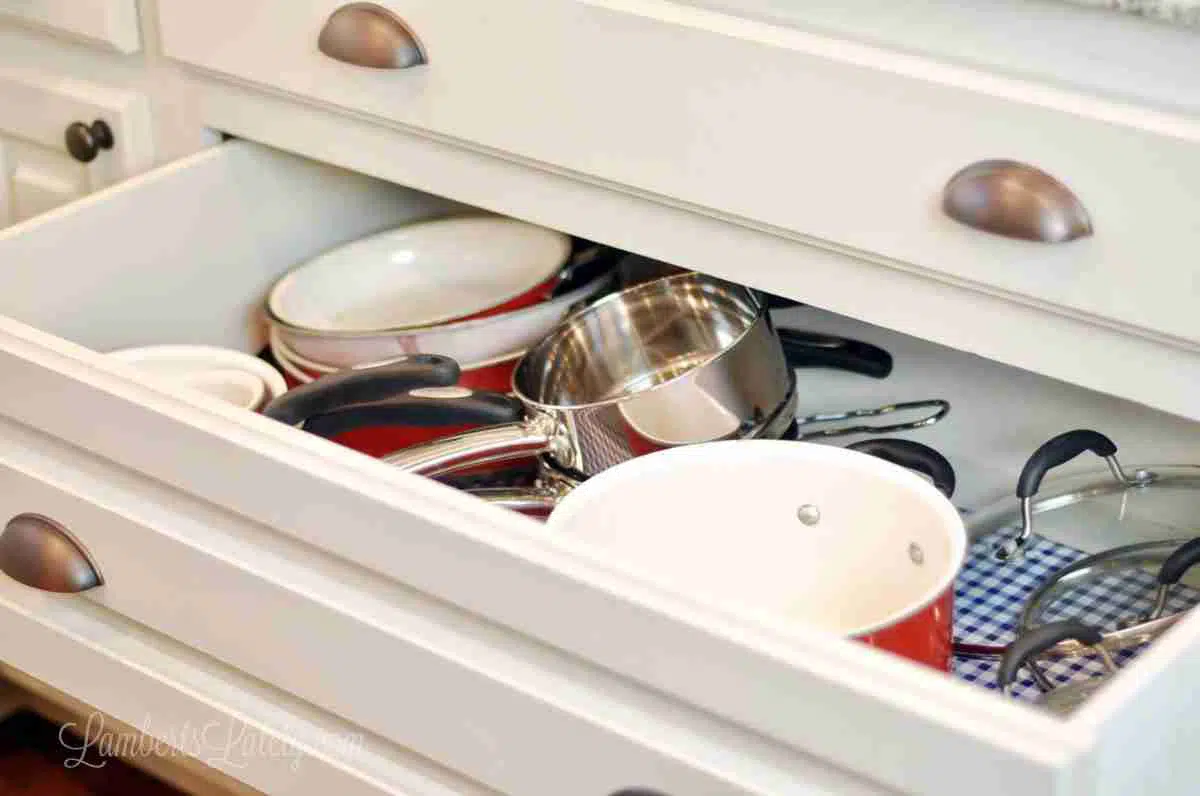 kitchen drawer with pots and pans.