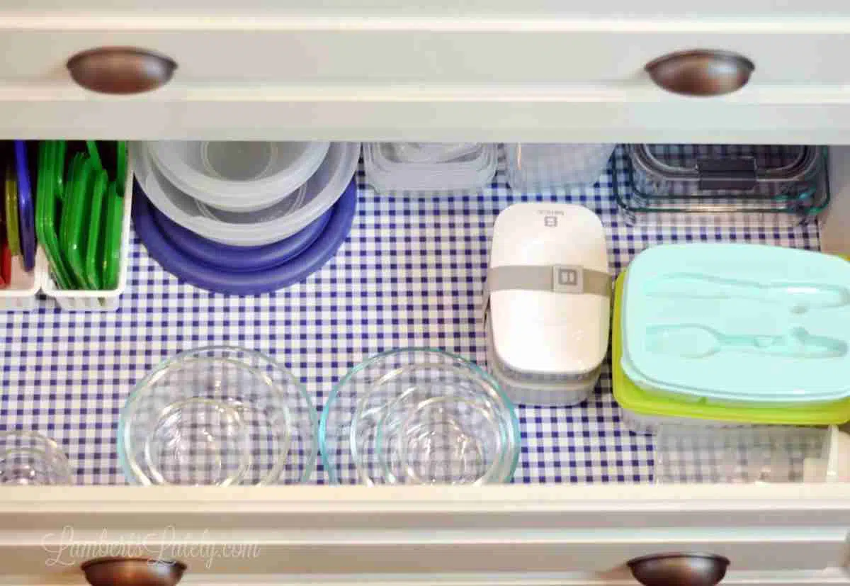 kitchen drawer with food storage containers.