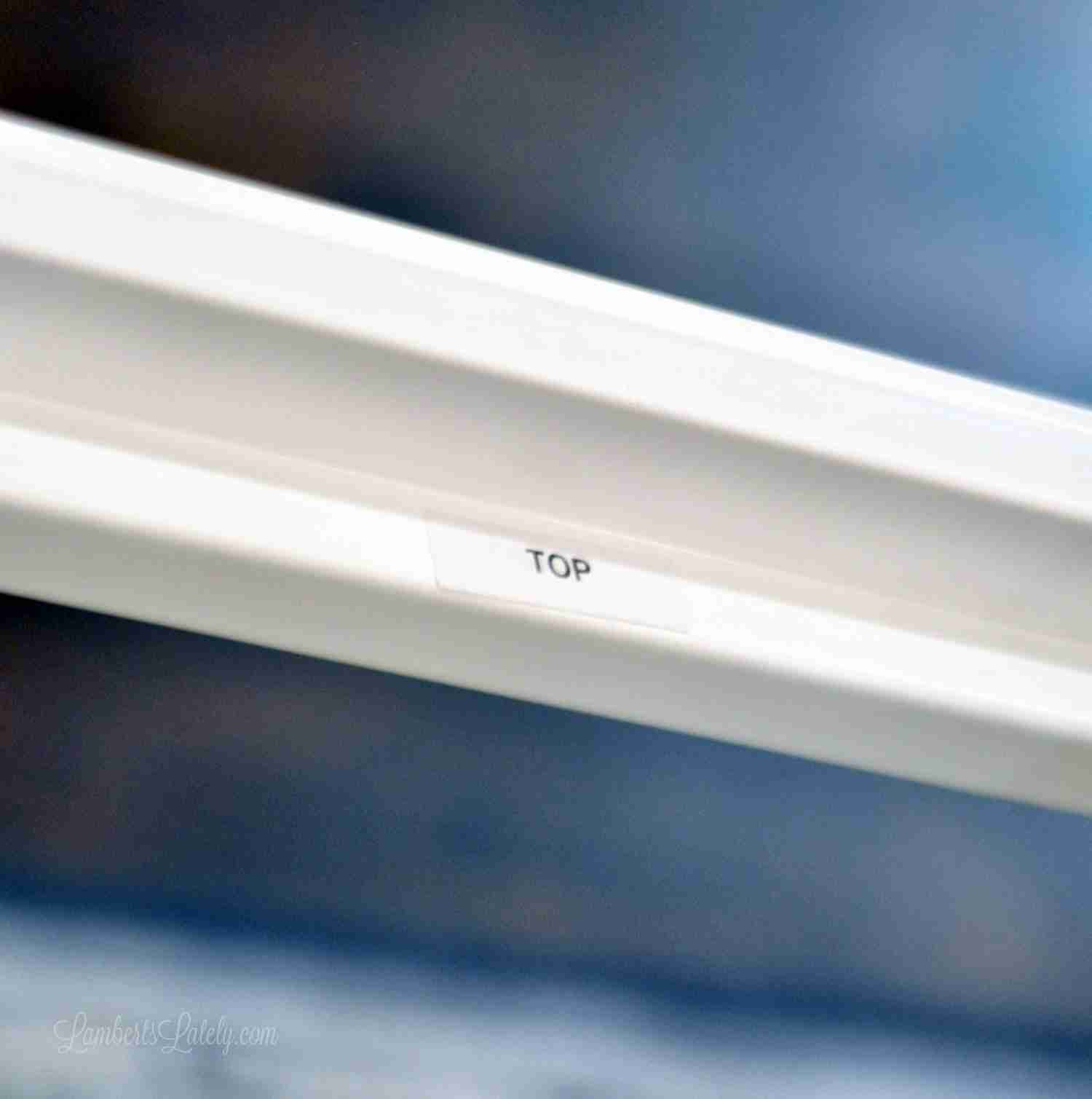 sticker showing top of blinds frame.