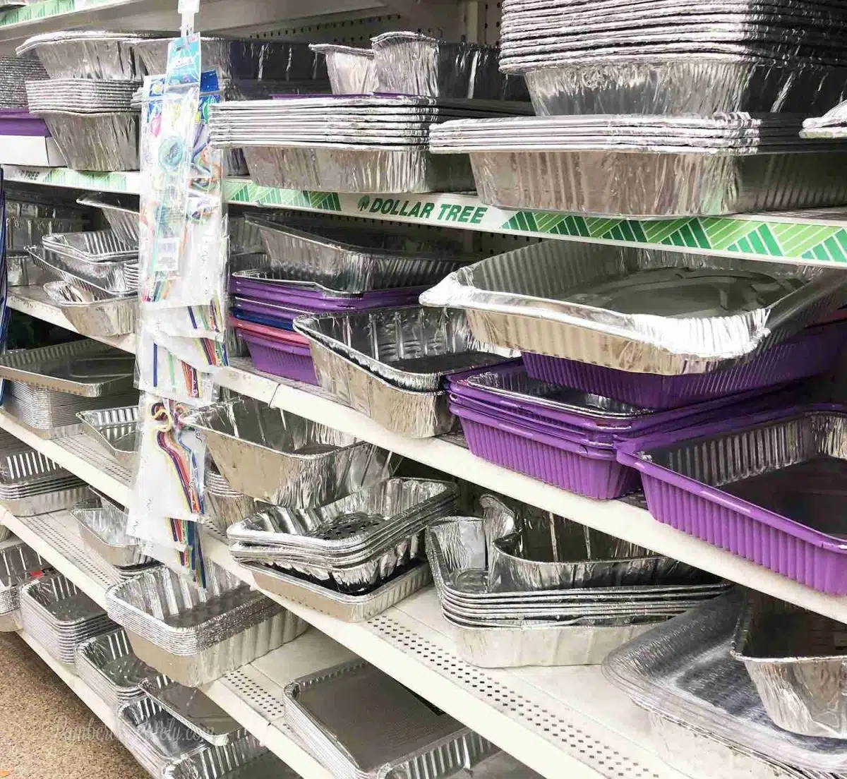 aluminum food trays on a store shelf.
