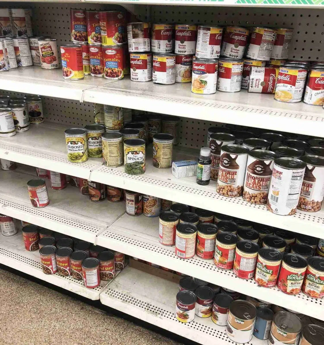 cans on a store shelf.