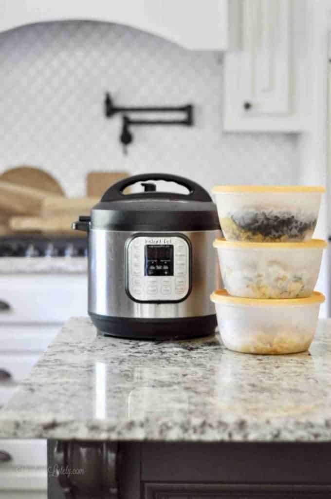 freezer meals next to an Instant Pot on a kitchen counter.