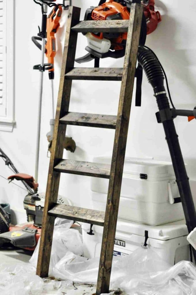 finished diy blanket ladder in a garage.