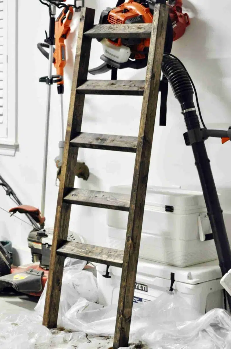 finished diy blanket ladder in a garage.