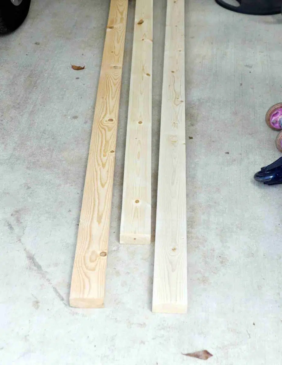 2x4 wood laying on a garage floor.