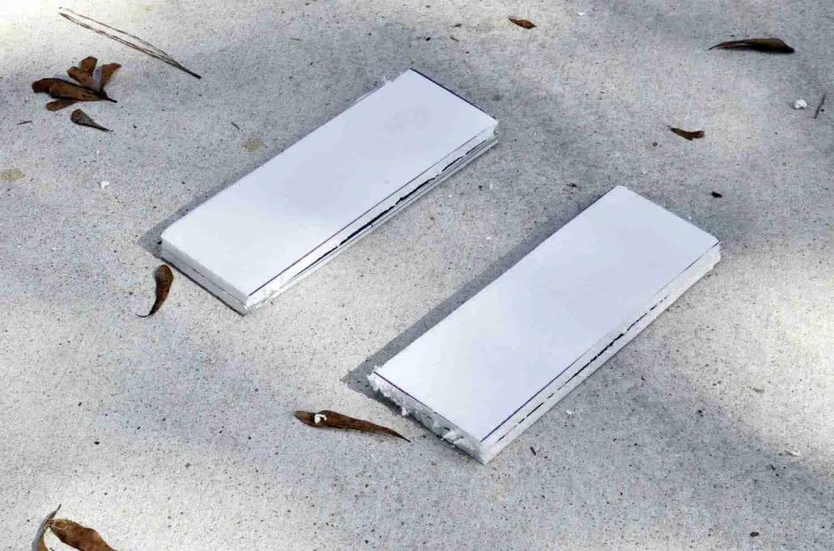 two rectangular pieces of foam board.