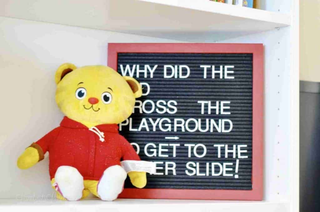 letter board, stuffed animal on a shelf.