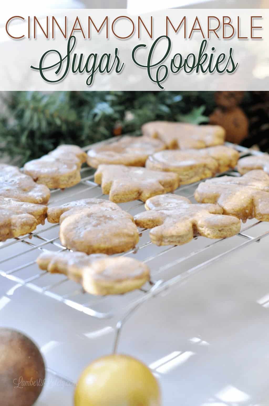 This fun twist on the traditional cut out sugar cookie recipe gives them a cream cheese cinnamon swirl...tastes amazing with the cinnamon sugar icing! These are great for Christmas baking.