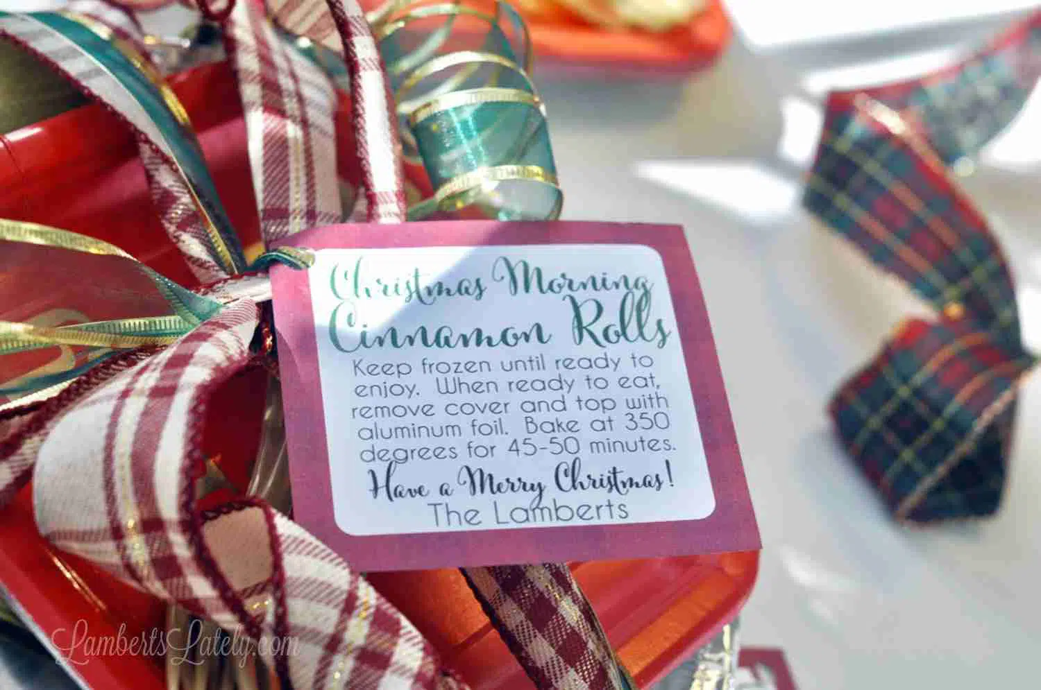 Christmas morning cinnamon rolls gift tag on a pan with ribbon