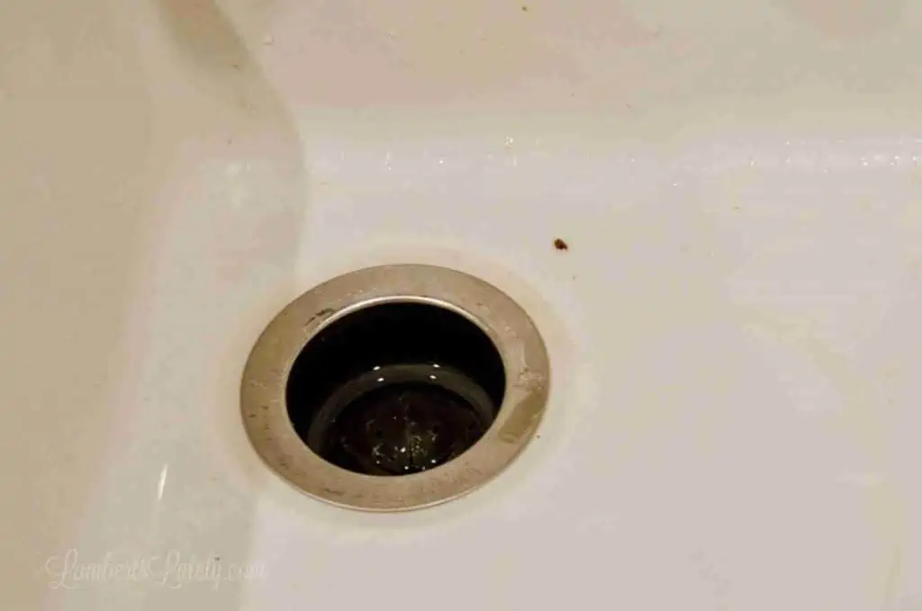 dirty porcelain sink drain.