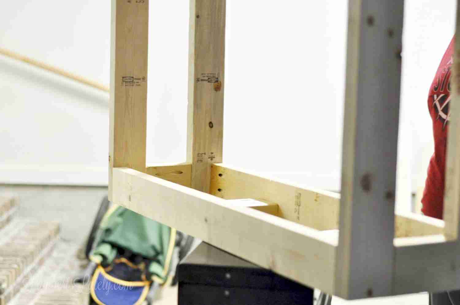 table upside down on a work bench.