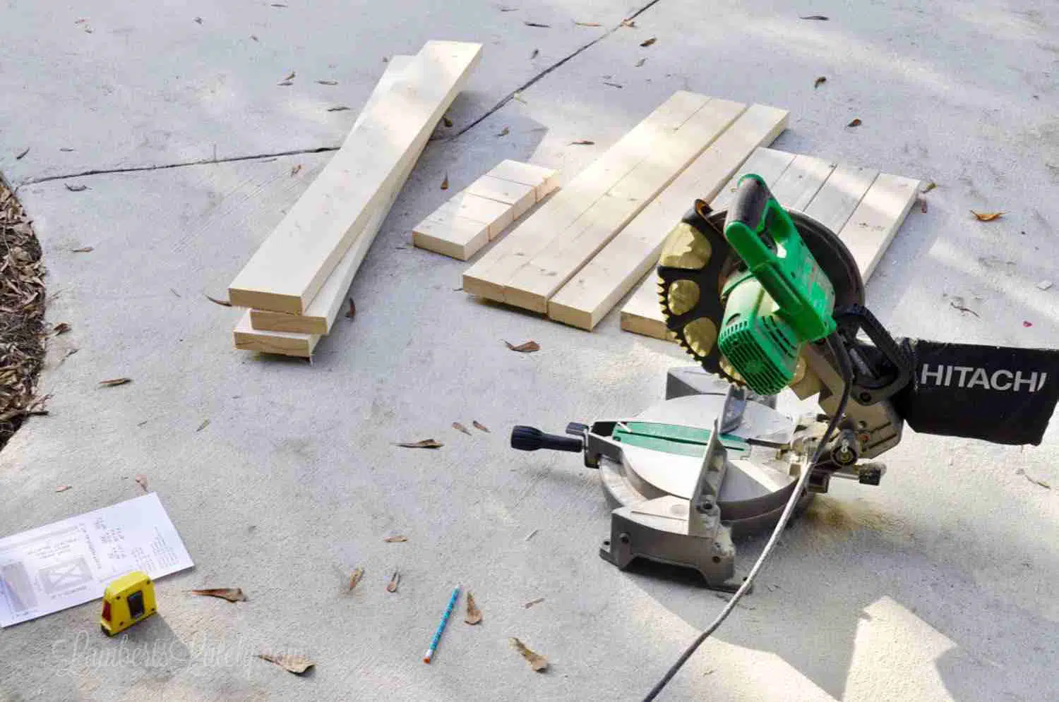 pieces of cut 2x4 next to a miter saw.