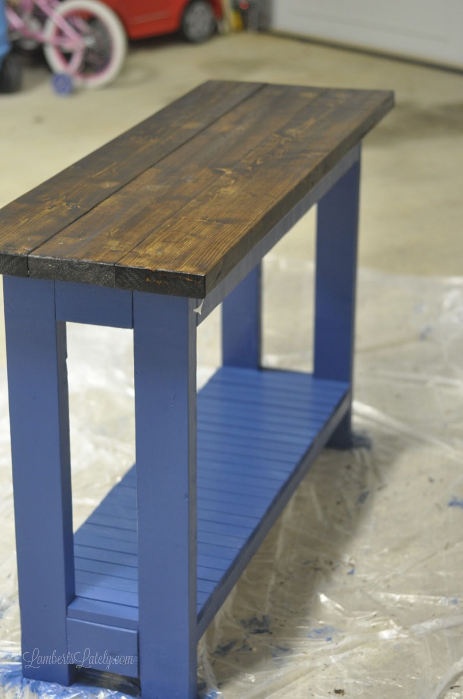 blue and brown console table after painting.
