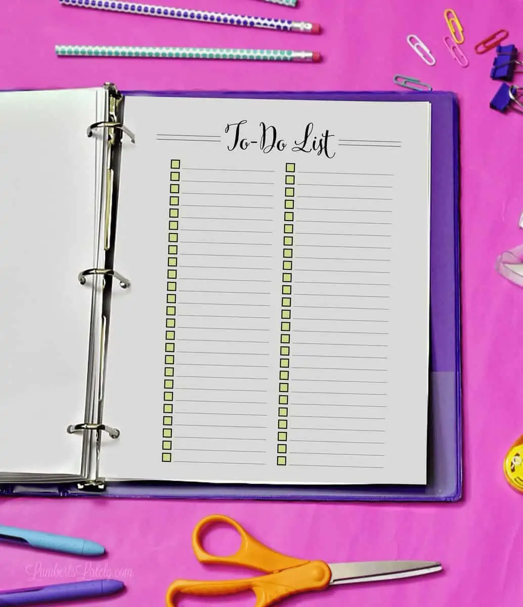 to do list printable in a purple notebook.