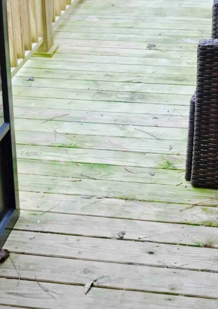 wood deck with green stains.