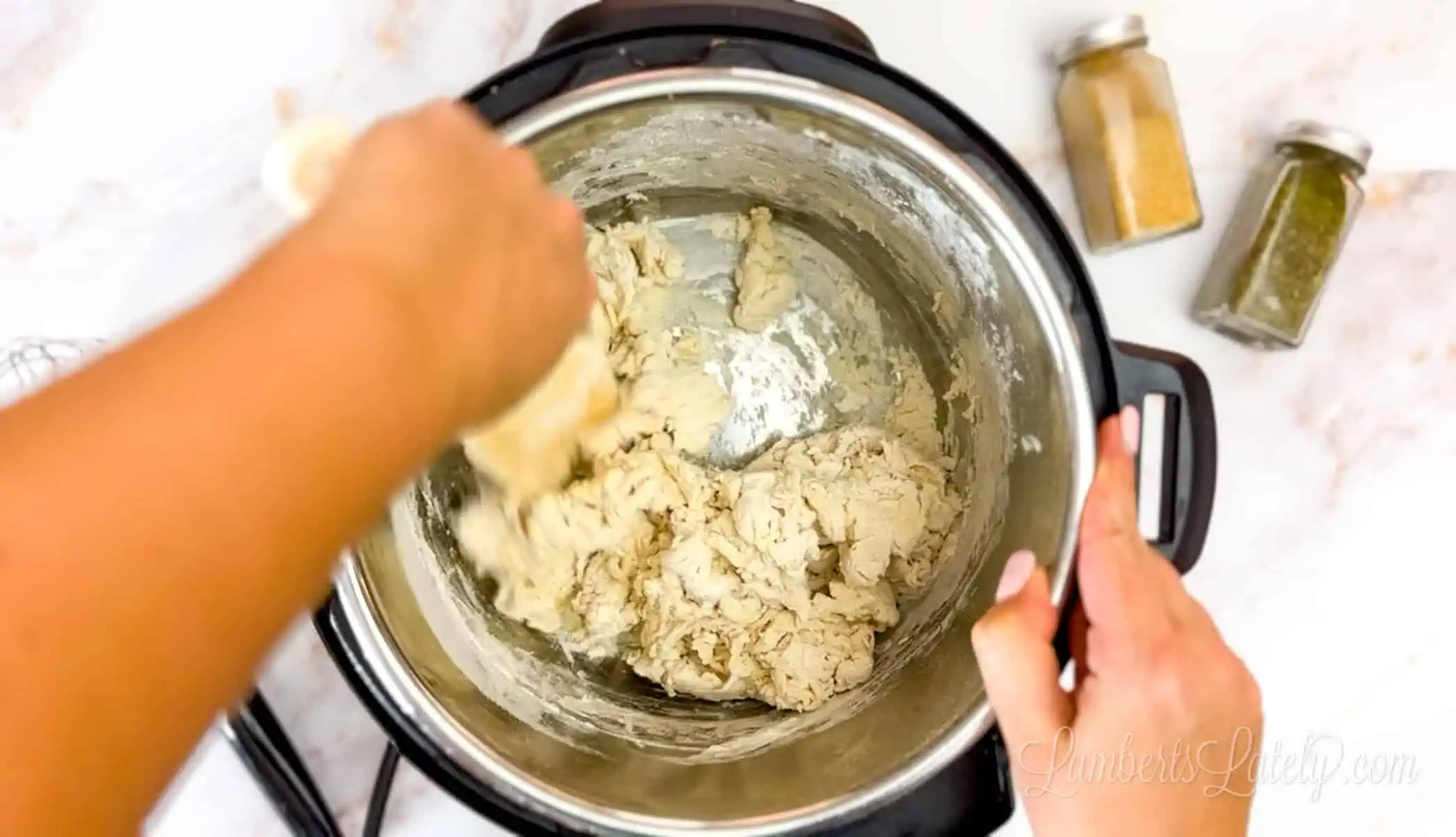 mixing flour and water in an instant pot.