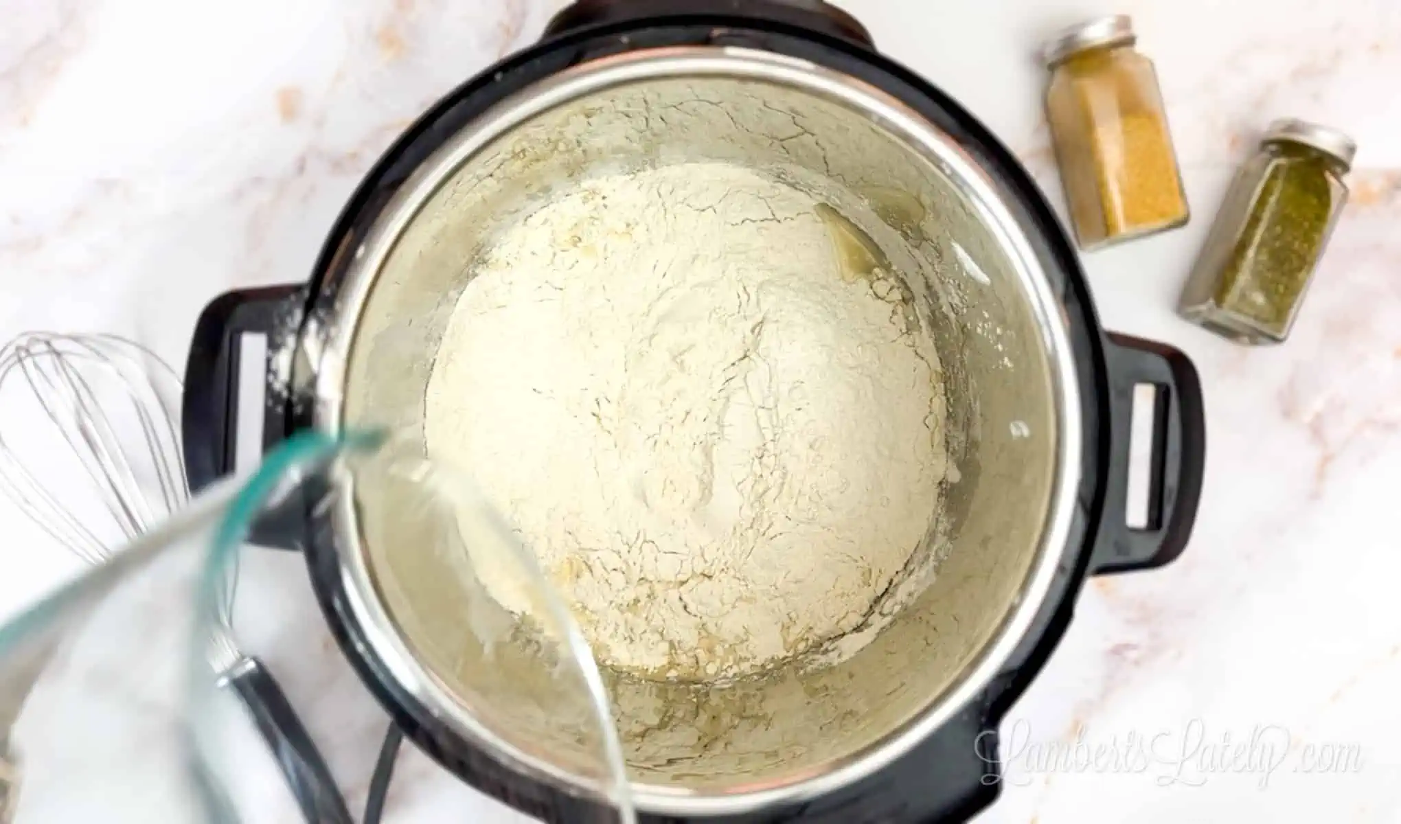 pouring flour into an instant pot.