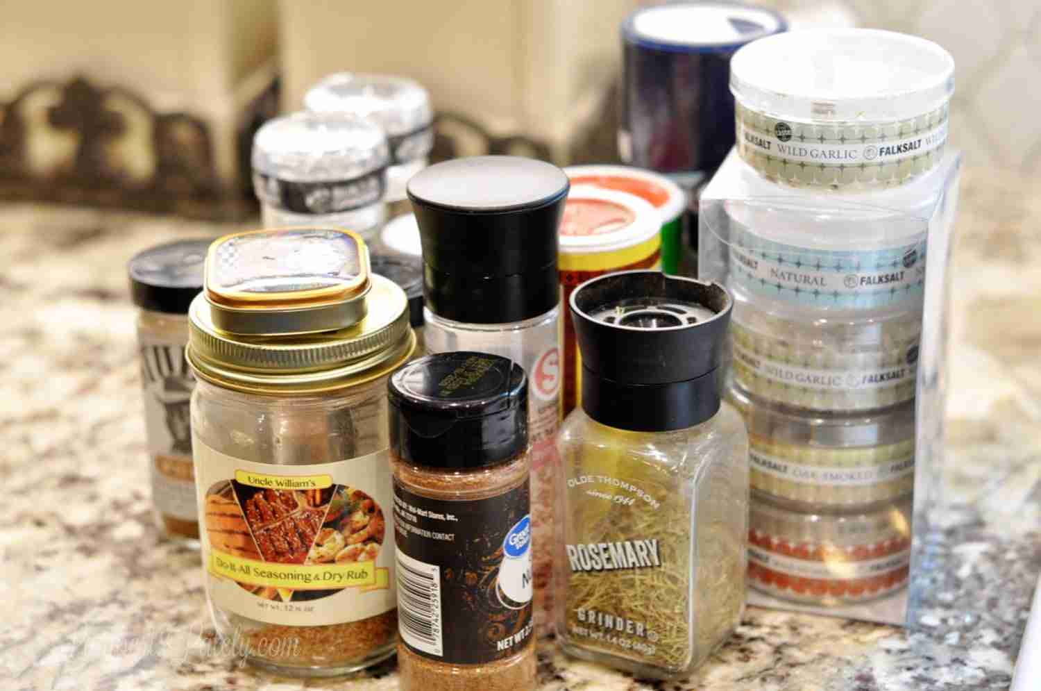 collection of random spices on a counter.