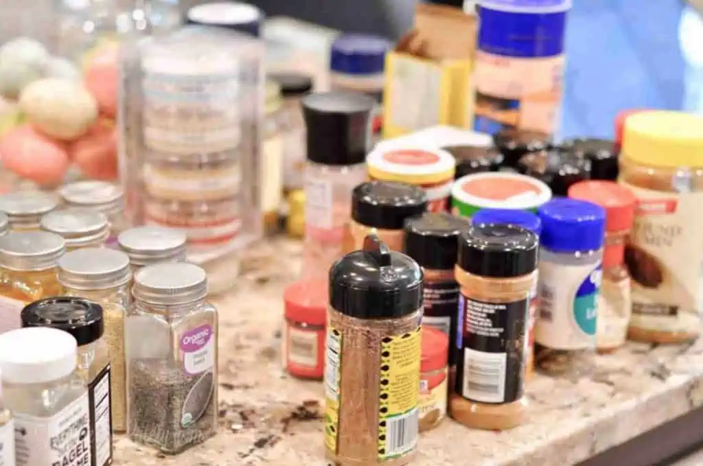 collection of random spices on a counter.