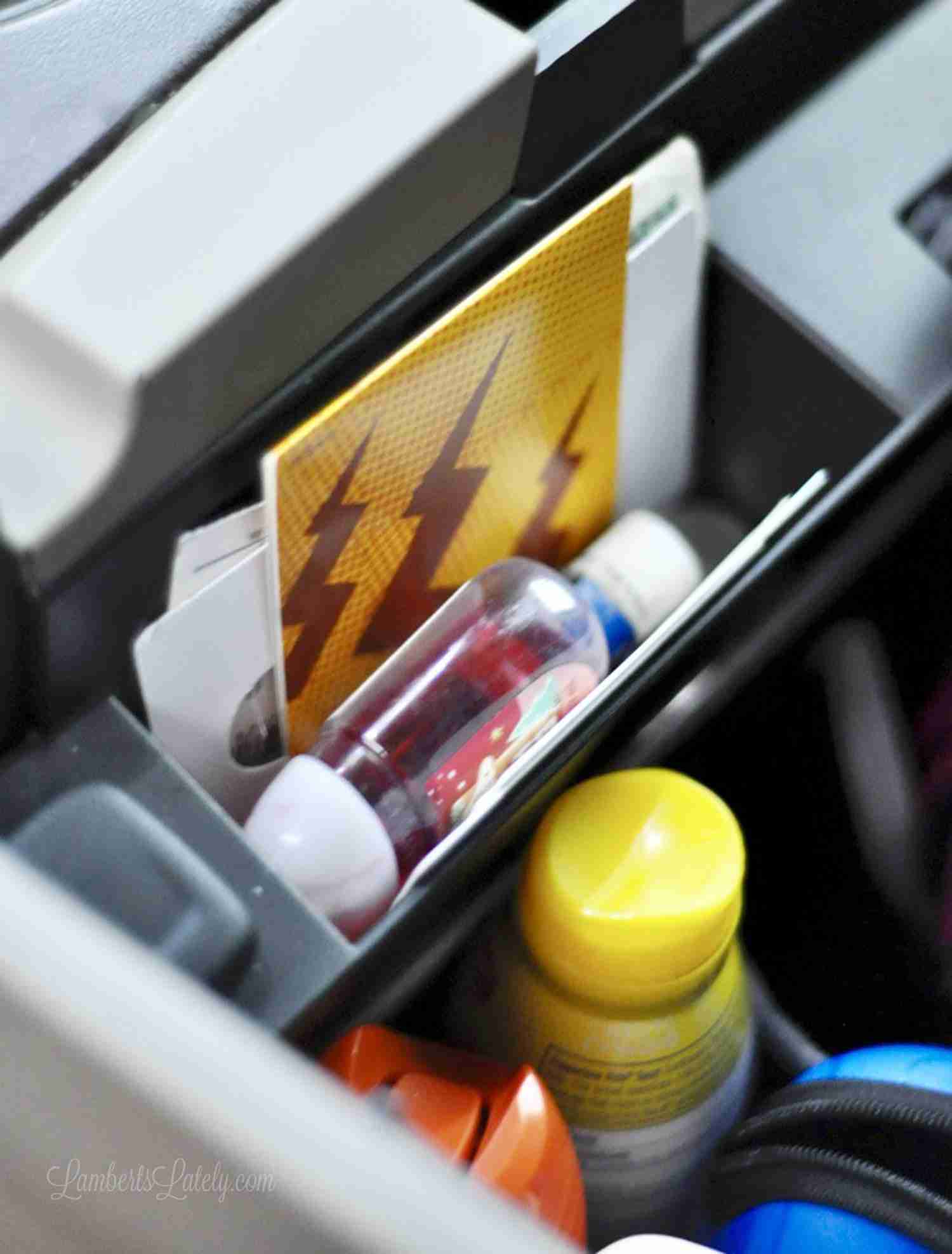 plastic organizer in a car center console.