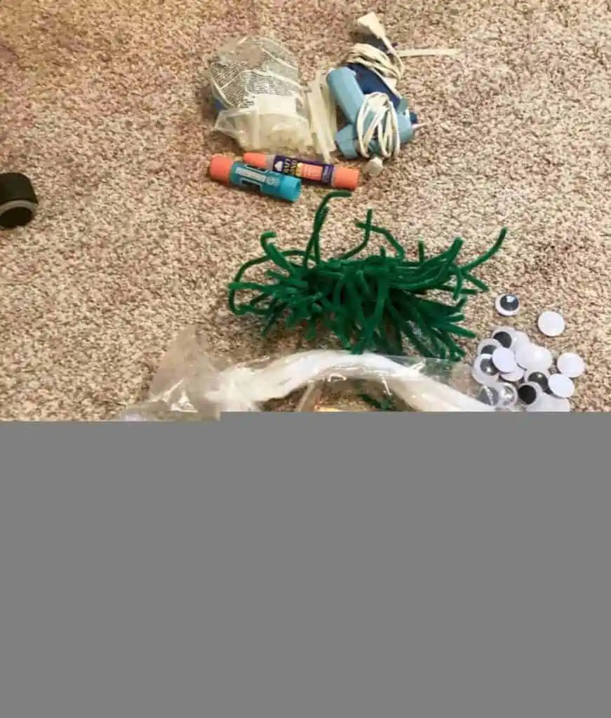 craft supplies on a carpeted floor.