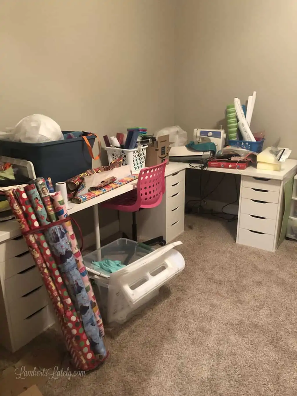 unorganized craft supplies covering a desk.