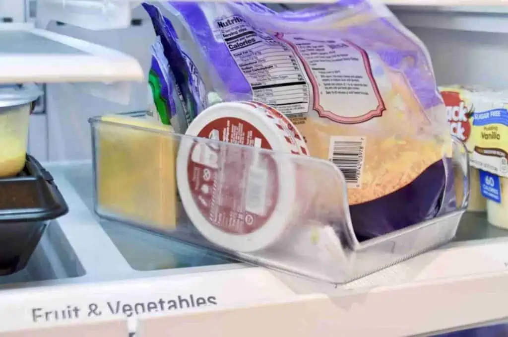 two clear refrigerator organization bins.