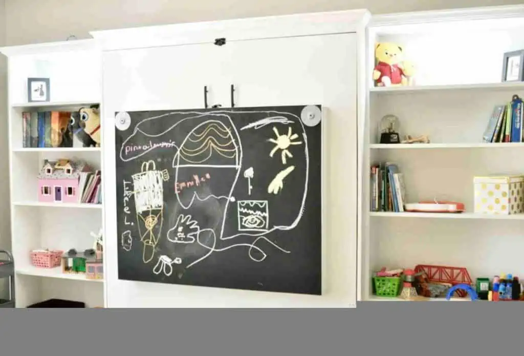 fold-out desk folded in; chalkboard on underside of desktop when folded in