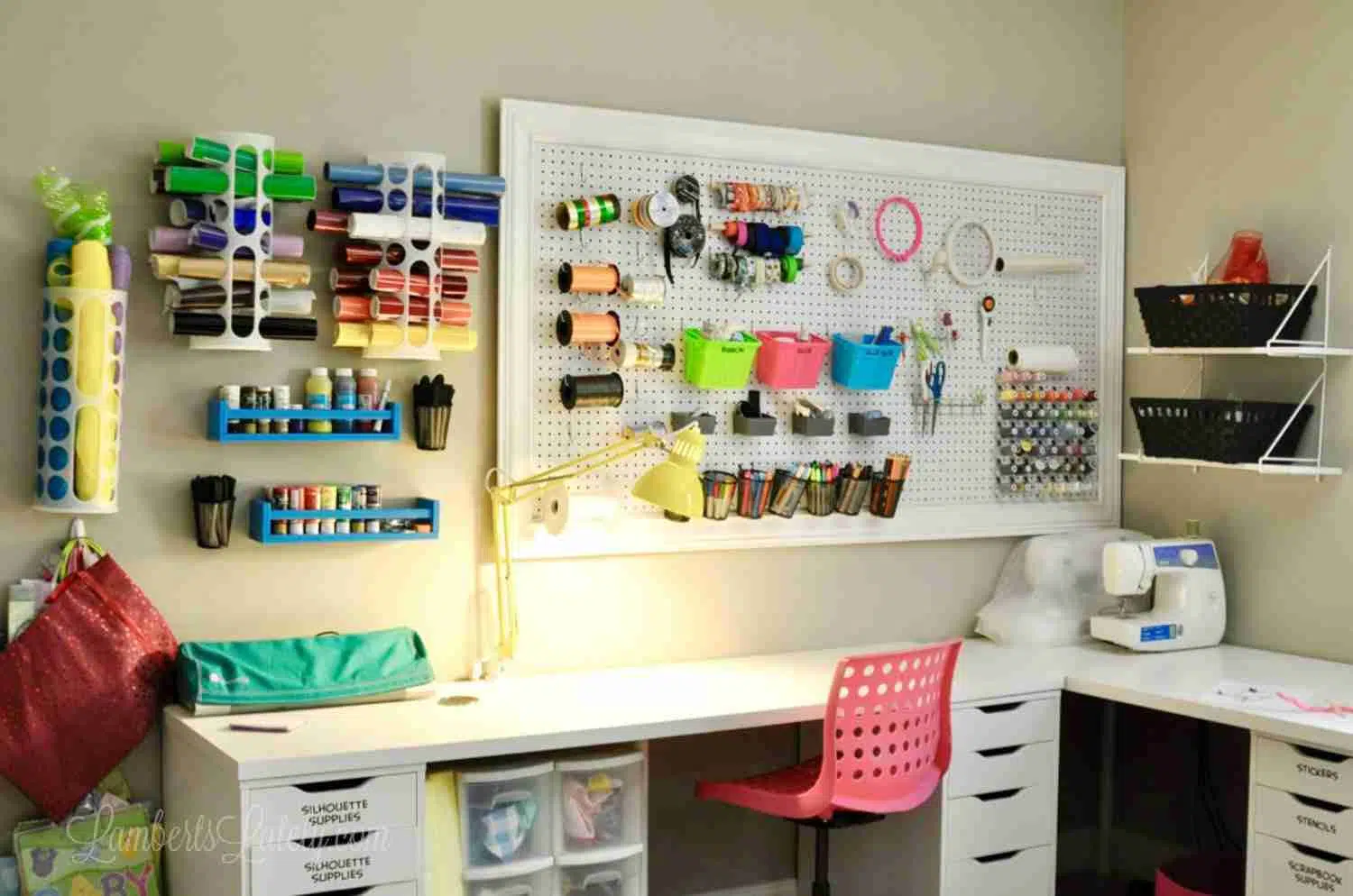 desk and pegboard in a craft room