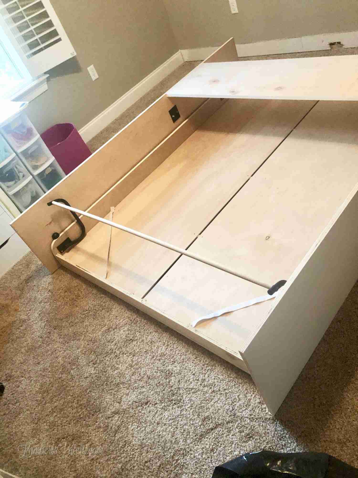 Create-a-bed flat on a bedroom floor.