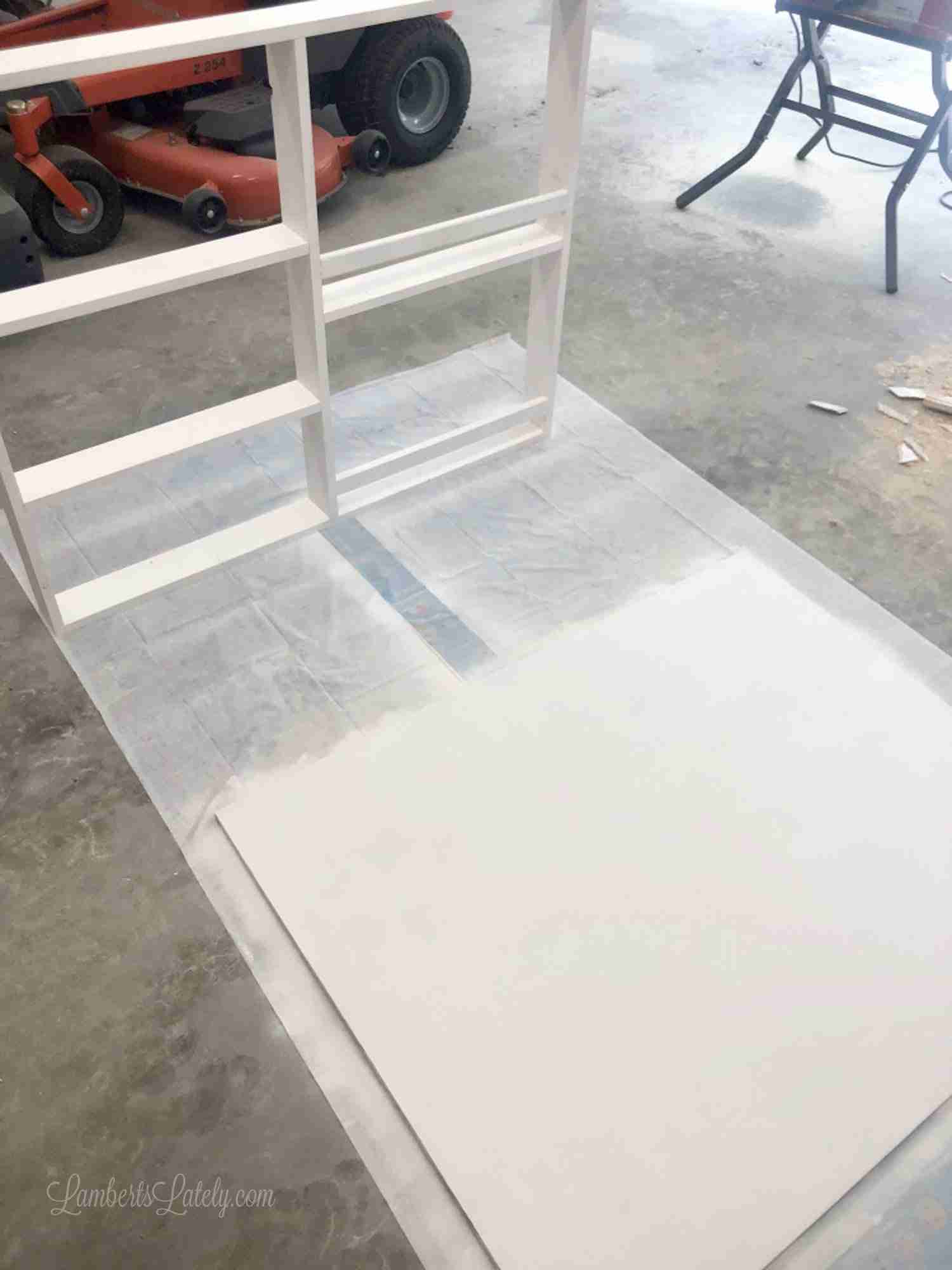 painting pieces of a fold-out desk white.
