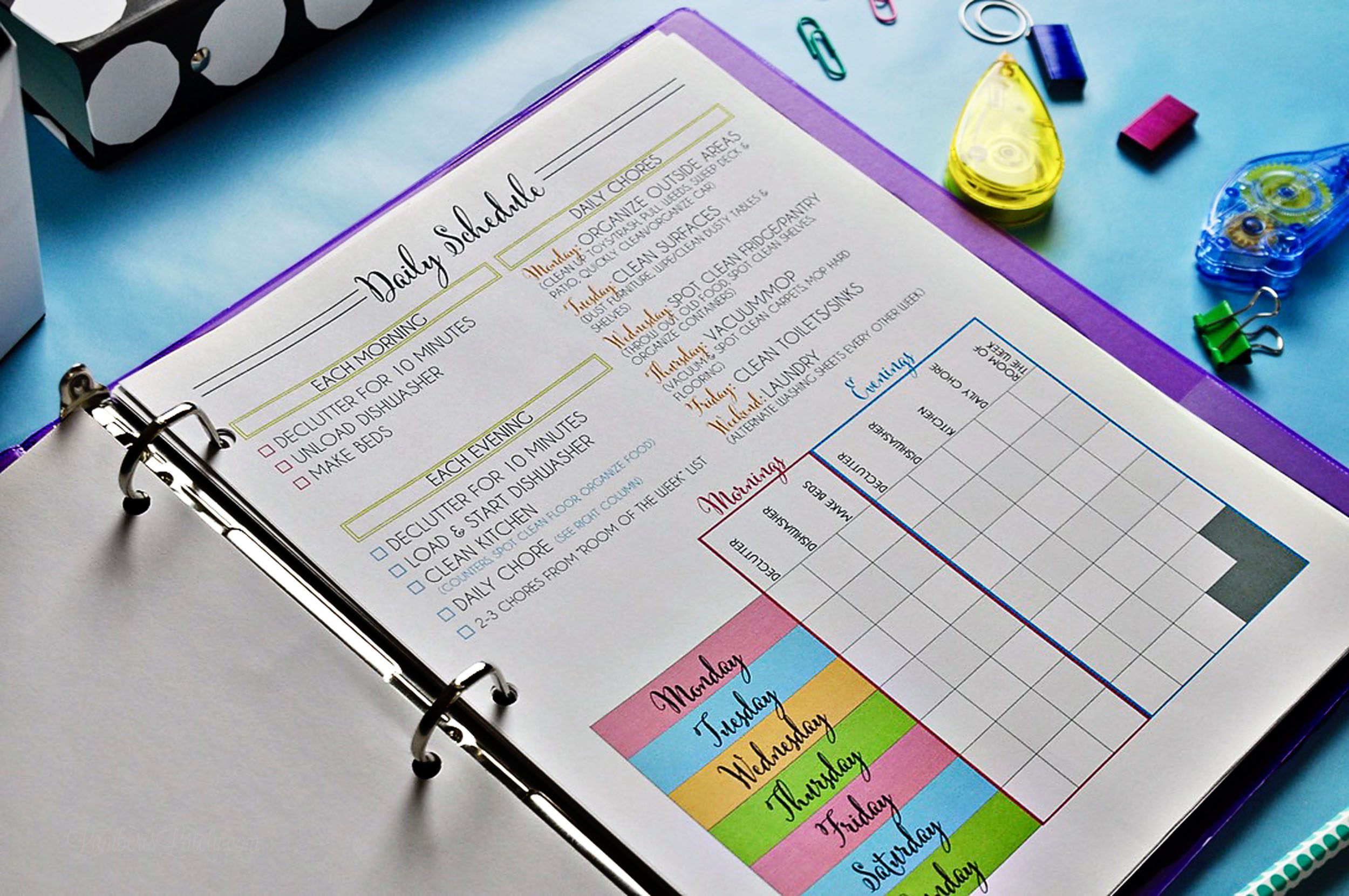 Daily cleaning schedule in a notebook on a desk