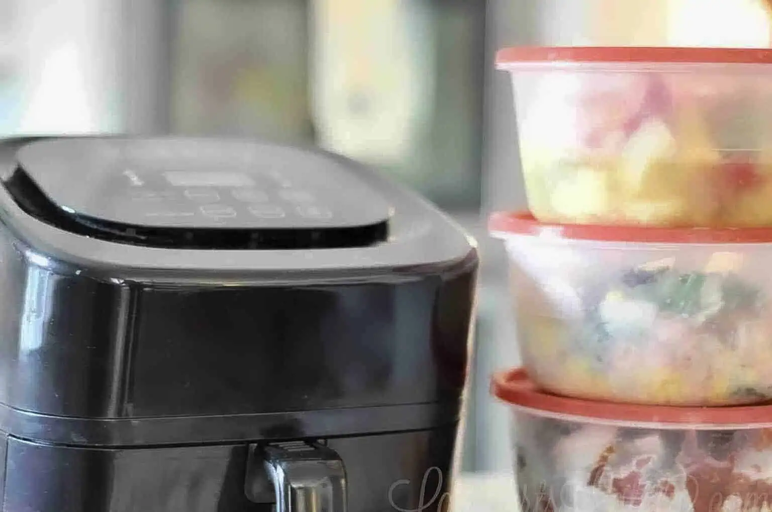 close up of air fryer and freezer meals.